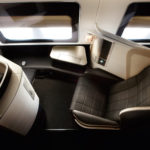 pesawat first travel