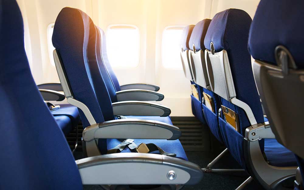 Tips Memilih Kursi Pesawat Agar Tidak Tertular Penyakit di Perjalanan